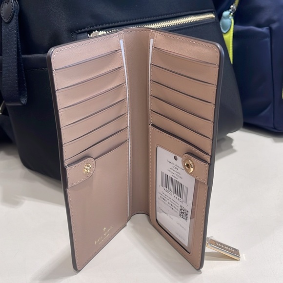 Kate Spade Madison Large Slim Bifold Wallet
Meringue 
NWT - Picture 5 of 16